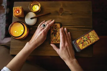 Unlock the mysteries of Tarot cards! Discover what Tarot is, its history, structure, and how these powerful tools work for self-reflection & spiritual guidance. Explore meanings & spreads.