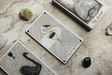 Go beyond the basics to explore the true, complex history of Tarot. Uncover its journey from Italian playing cards to a profound tool of self-discovery, contrasting early decks like the Marseille Tarot.