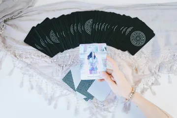 Uncover the profound influence of the Hermetic Order of the Golden Dawn on modern Tarot. Explore their system of correspondences, the creation of the Rider-Waite-Smith deck, and how this secret society revolutionized Tarot interpretation.